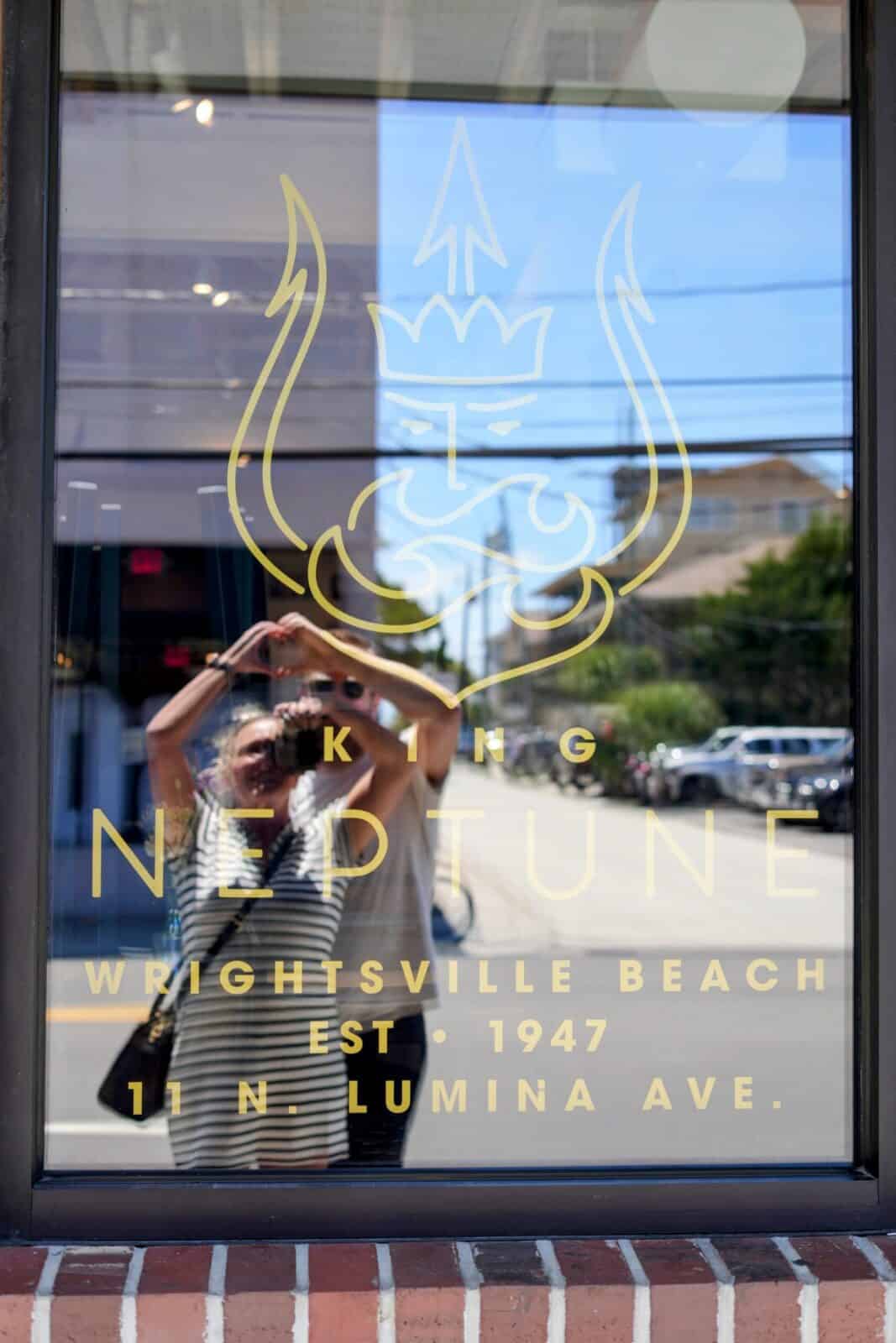 King Neptune restaurant with its gold trident logo, a Wrightsville Beach institution since 1947, in Wrightsville Beach, NC.