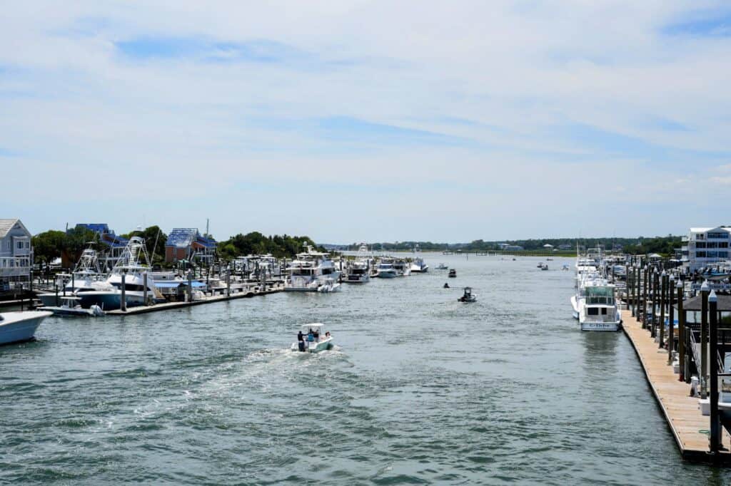 Wilmington NC boating communities — a community marina with boats in their slips on the Intracoastal Waterway