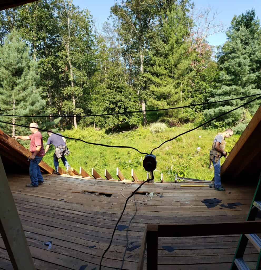 Crew working on the open roof deck during the renovation