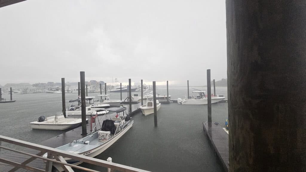 Storm clouds rolling in over boats at a Wilmington-area marina