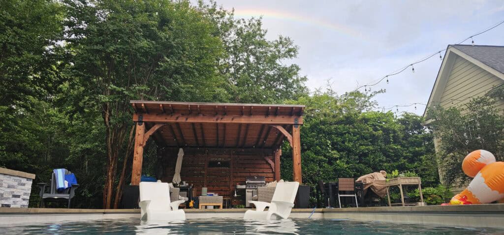 Our finished backyard pool and pergola after a total pool cost in Wilmington NC of about $273,000