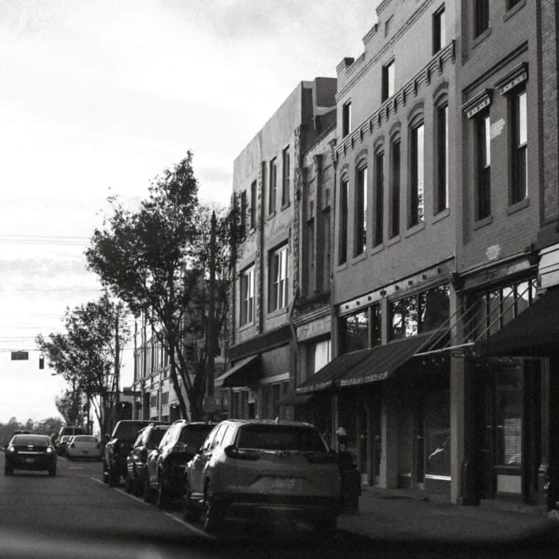 Historic brick storefronts in downtown Wilmington, NC