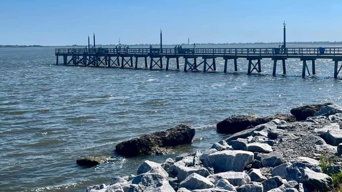 Wooden pier over calm coastal water — understanding what a deeded boat slip means in North Carolina