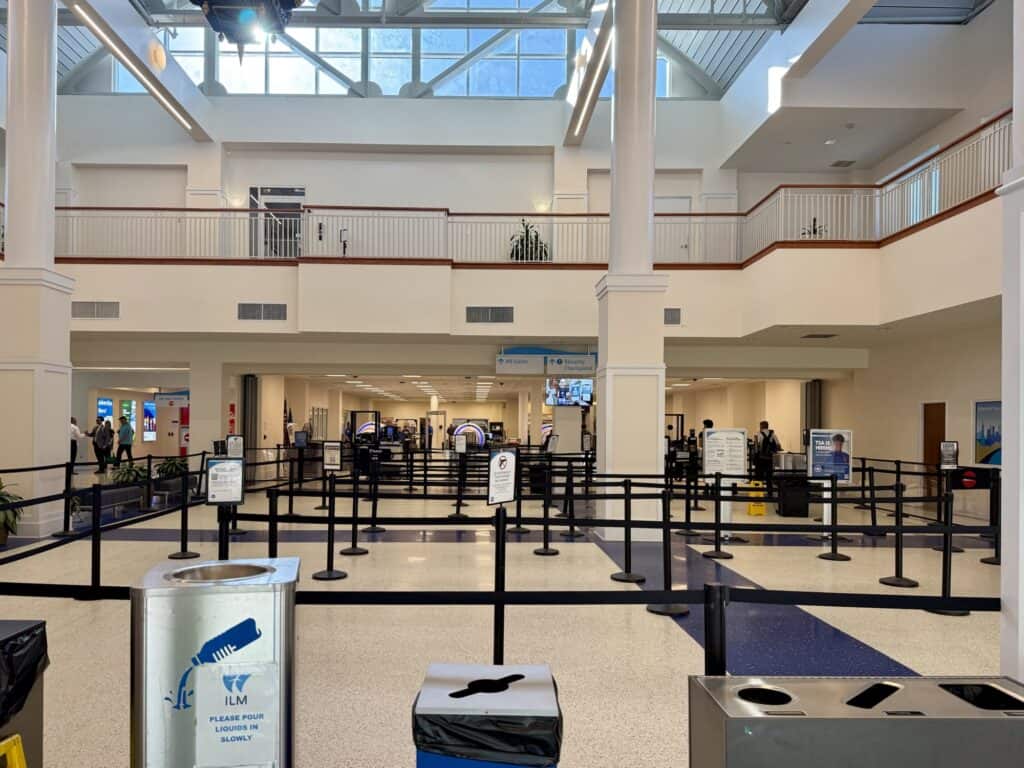 An empty TSA security checkpoint line at Wilmington International Airport (ILM), part of a flying commute from Wilmington NC